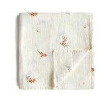 Load image into Gallery viewer, Mushie Organic Muslin Swaddle - Happyness
